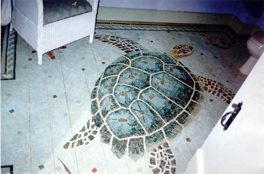 sea turtle painted on a wood floor